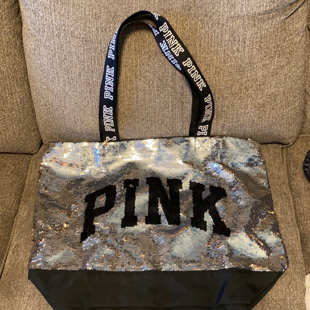 Pink bag. Black and silver sequins with Pink logo on front.